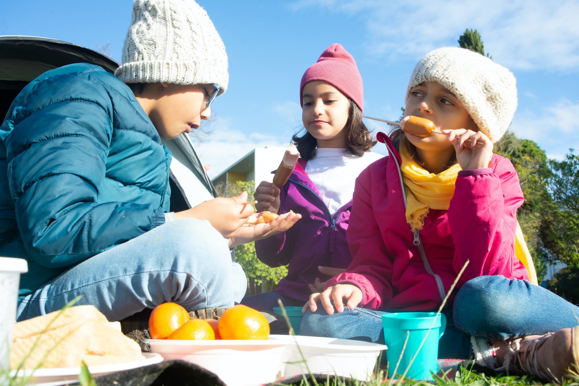 kids having picnic because they have their camping gear essentials