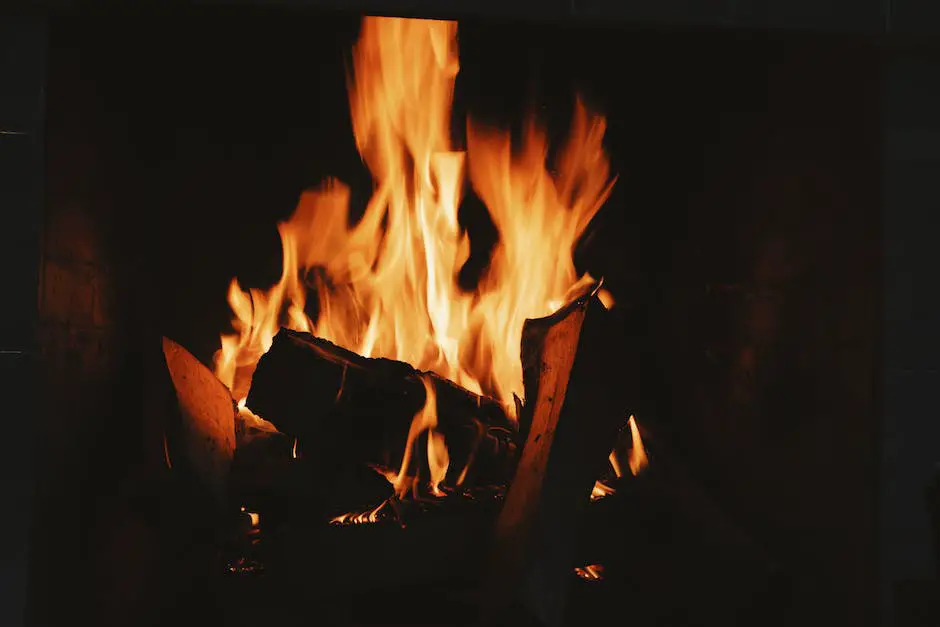 A person building a fire in the wilderness surrounded by nature and mountains. Weekend Camping Ideas for Students: Weekend Camping Ideas for Students